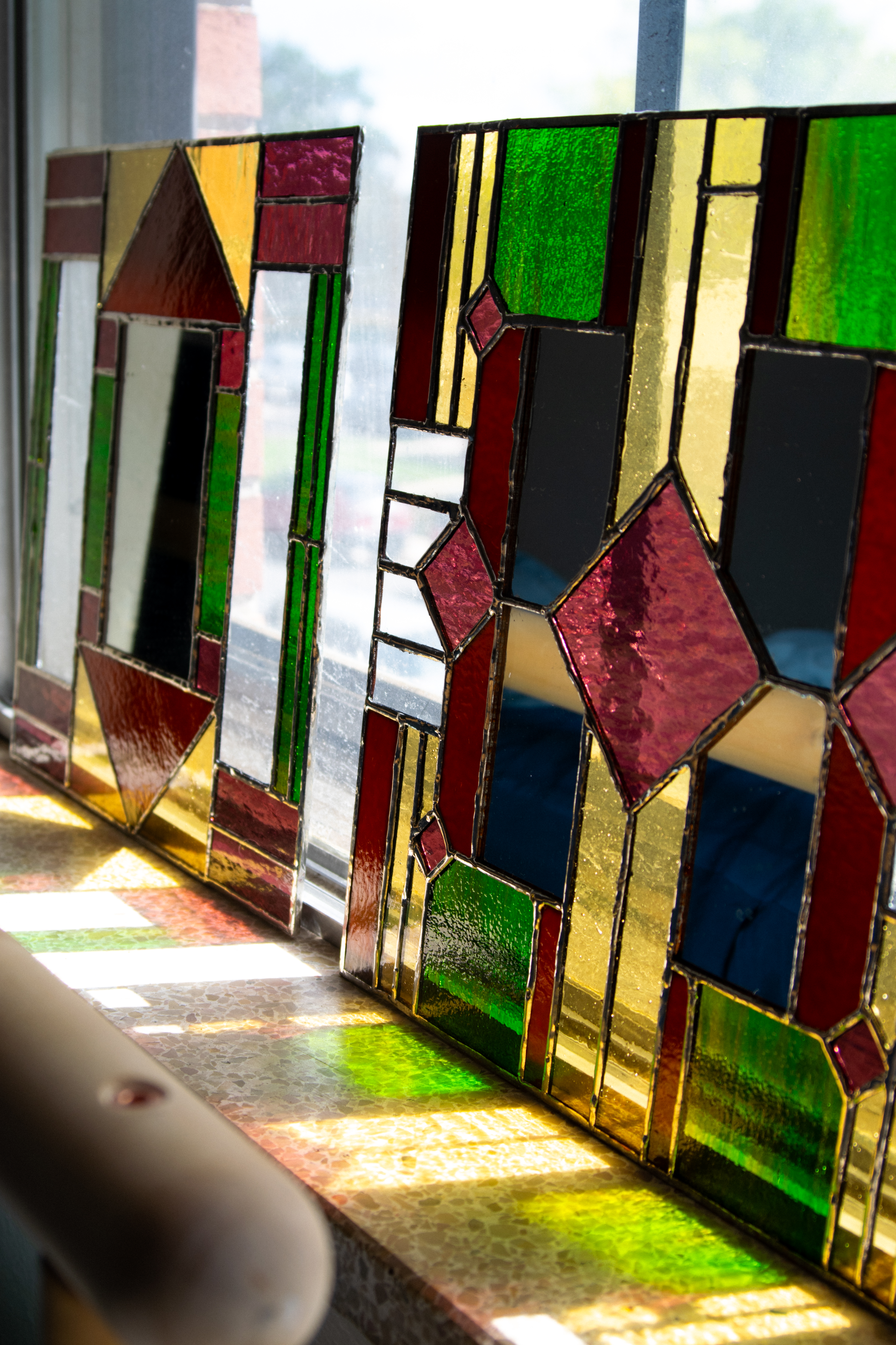 a duo of craftsman inspired stained glass pieces